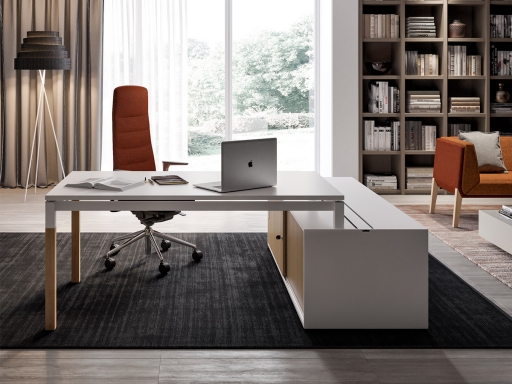 Bureau en angle avec piétement bois sur meuble de rangement