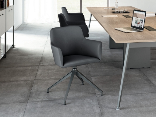 Fauteuil de réunion ESTEL avec base pyramidale en simili cuir; fabriqué en Italie