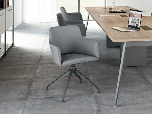 Fauteuil de réunion ESTEL avec base pyramidale en simili cuir; fabriqué en Italie